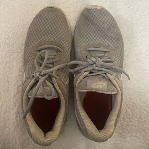 Grey Nike runners